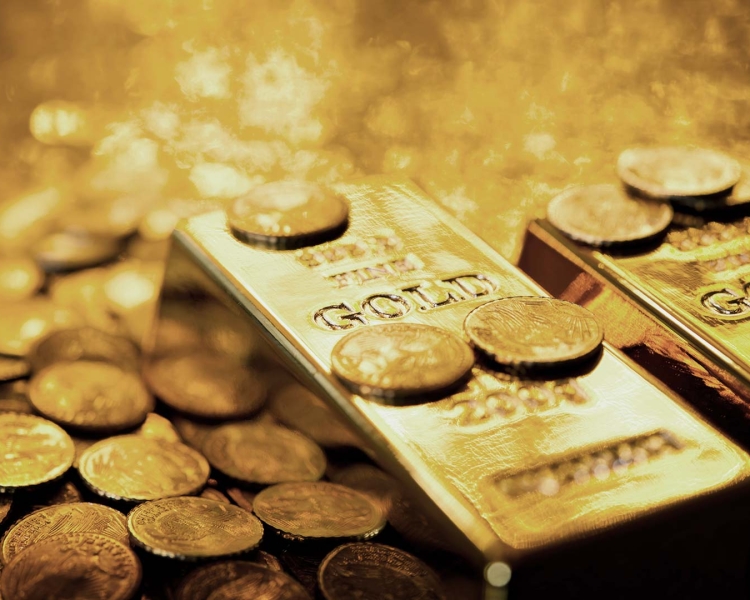 Goldbarren und Goldmünzen